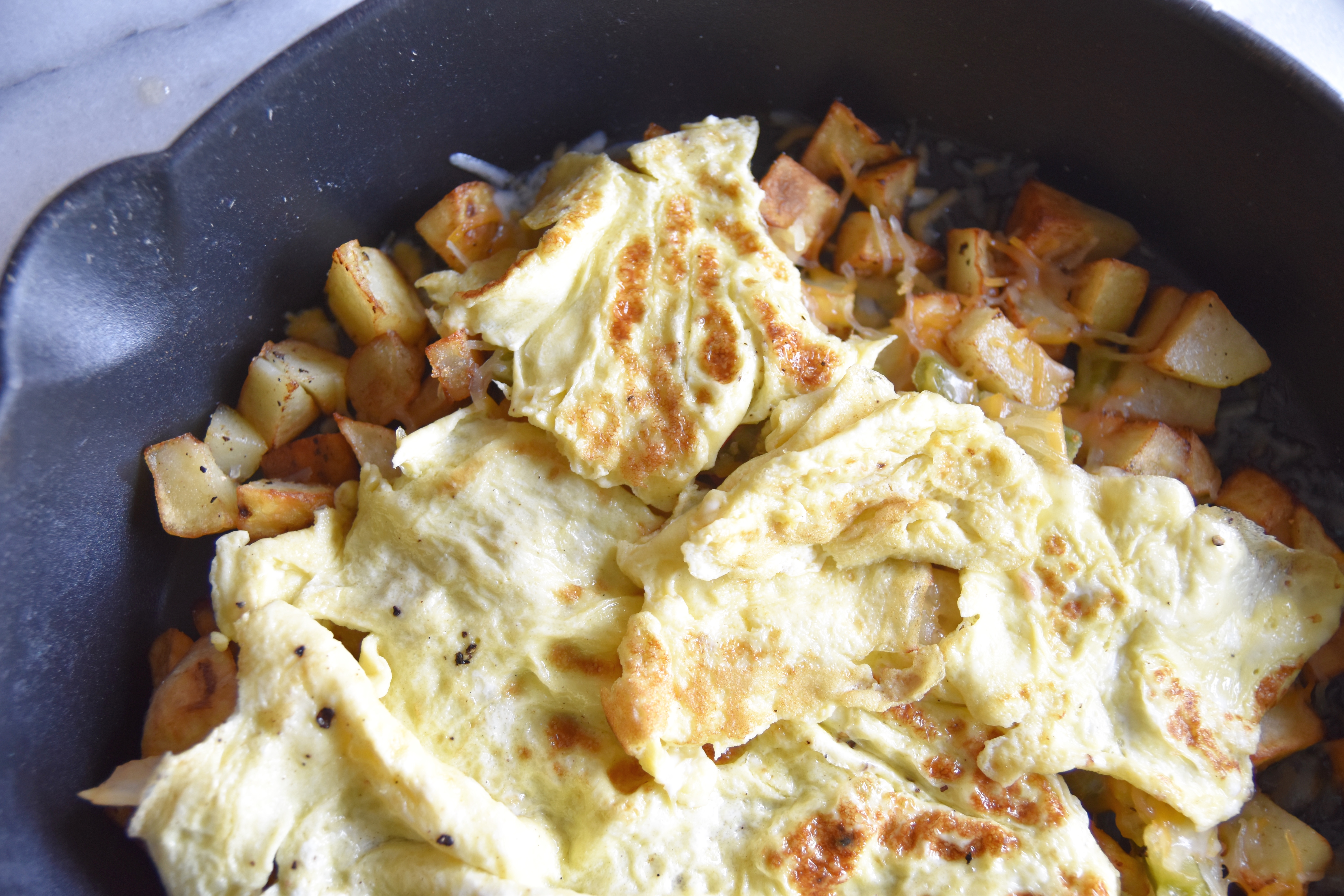 A2F Breakfast skillet potatoes and cheese and eggs