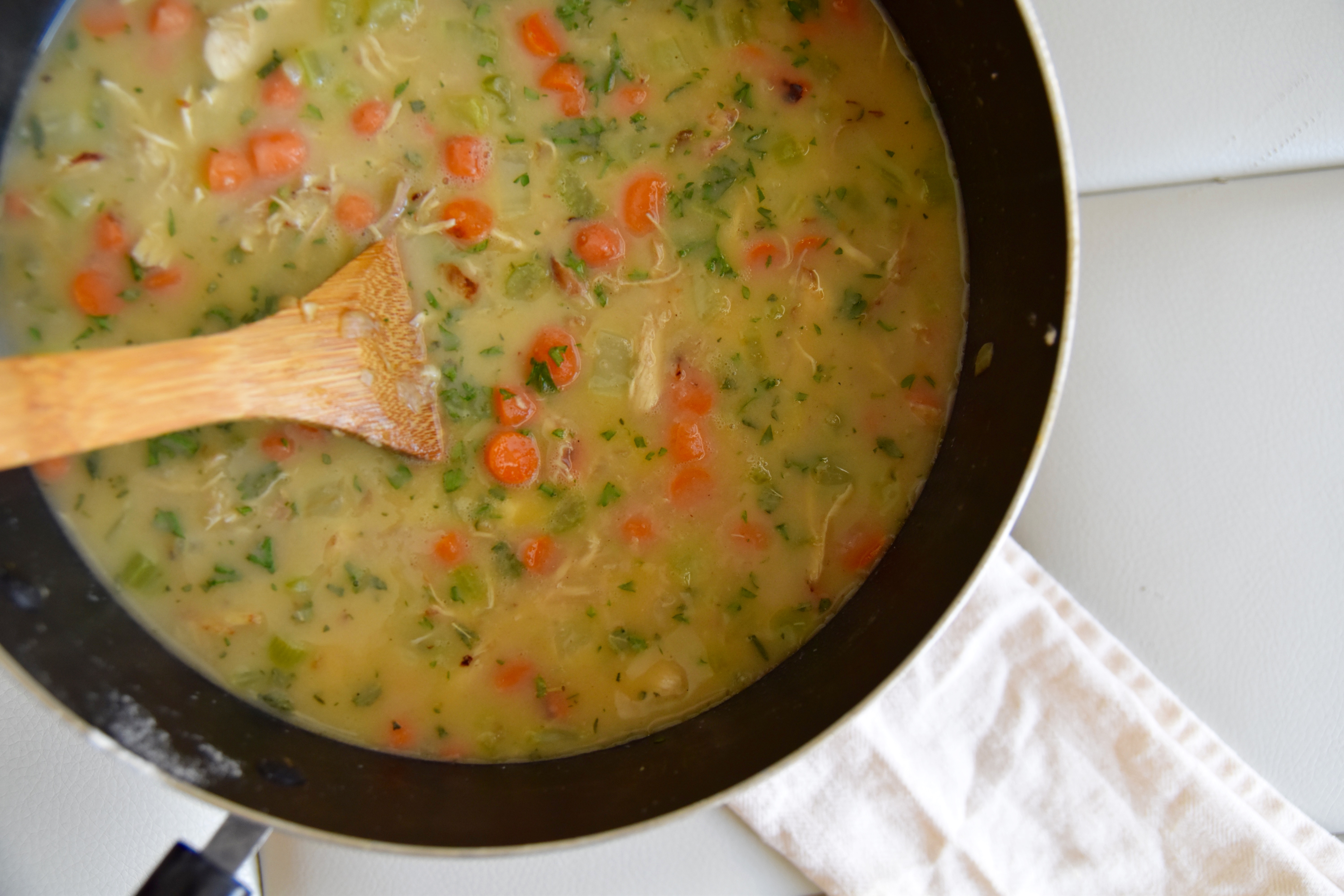 Inside stew of chicken pot pie with parsley