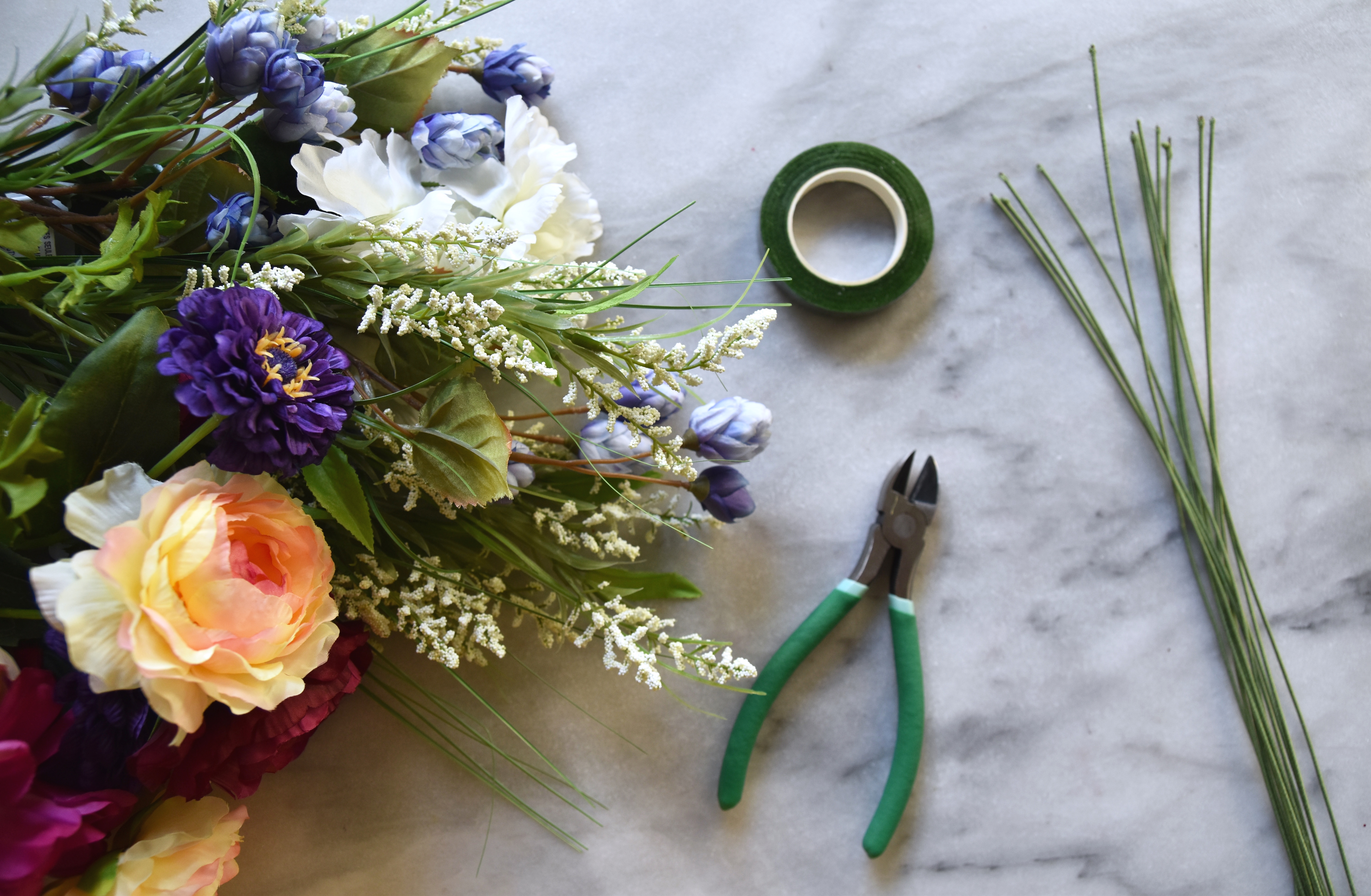 DIY flower crown supplies- floral wire, green tape, pliers, flowers