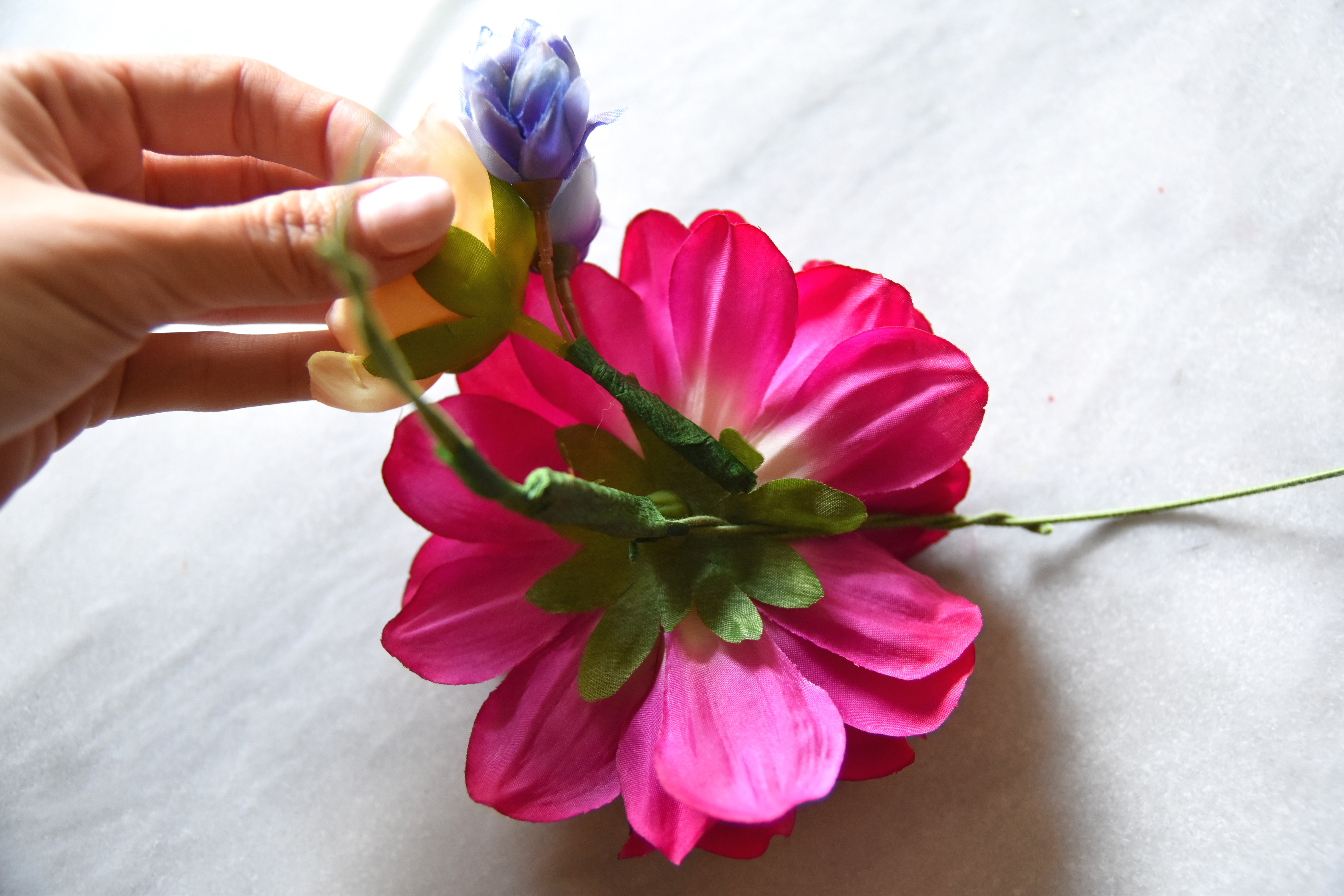 DIY flower crown begin to tape on headband