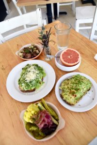 Park Cafe brunch with avocado toast, kale toast, grapefruit, and home made pickles