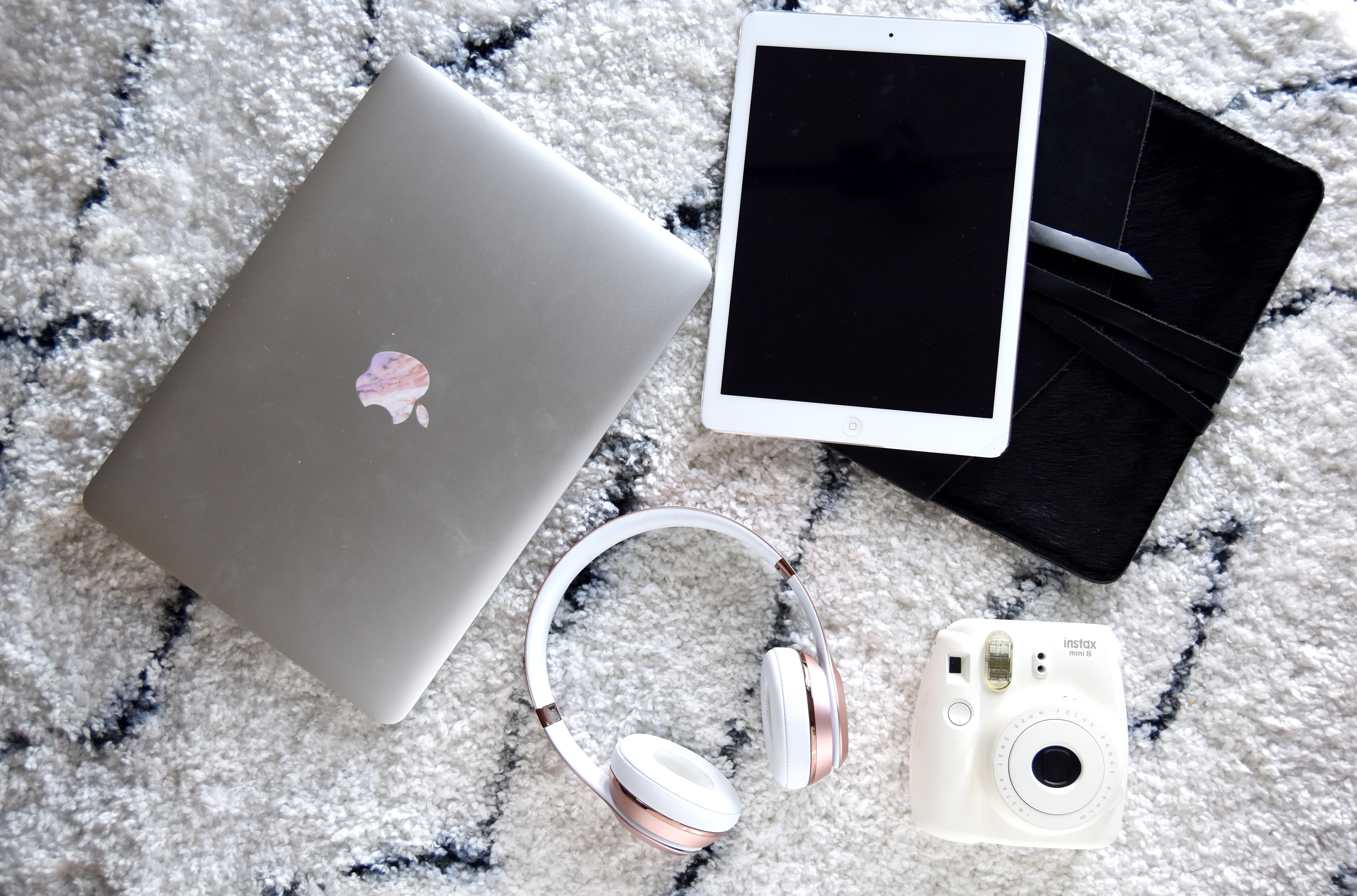 Electronics with polaroid, ipad, beats headphones and laptop