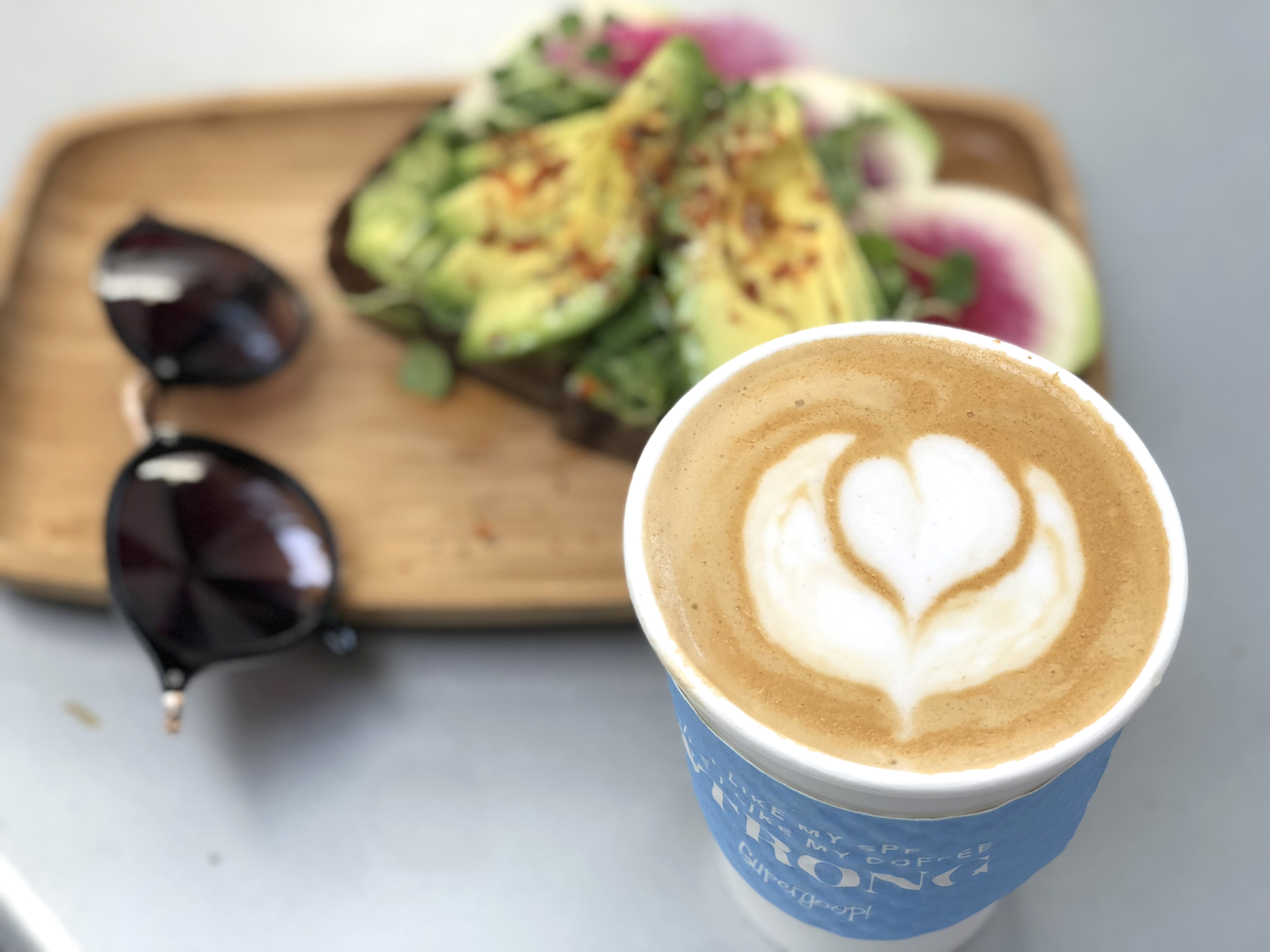 Avocado toast and cappuccino at Alfred Coffee