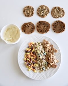 Flay lay of chocolate chip cookies, haagen daaz vanilla ice cream and cereal