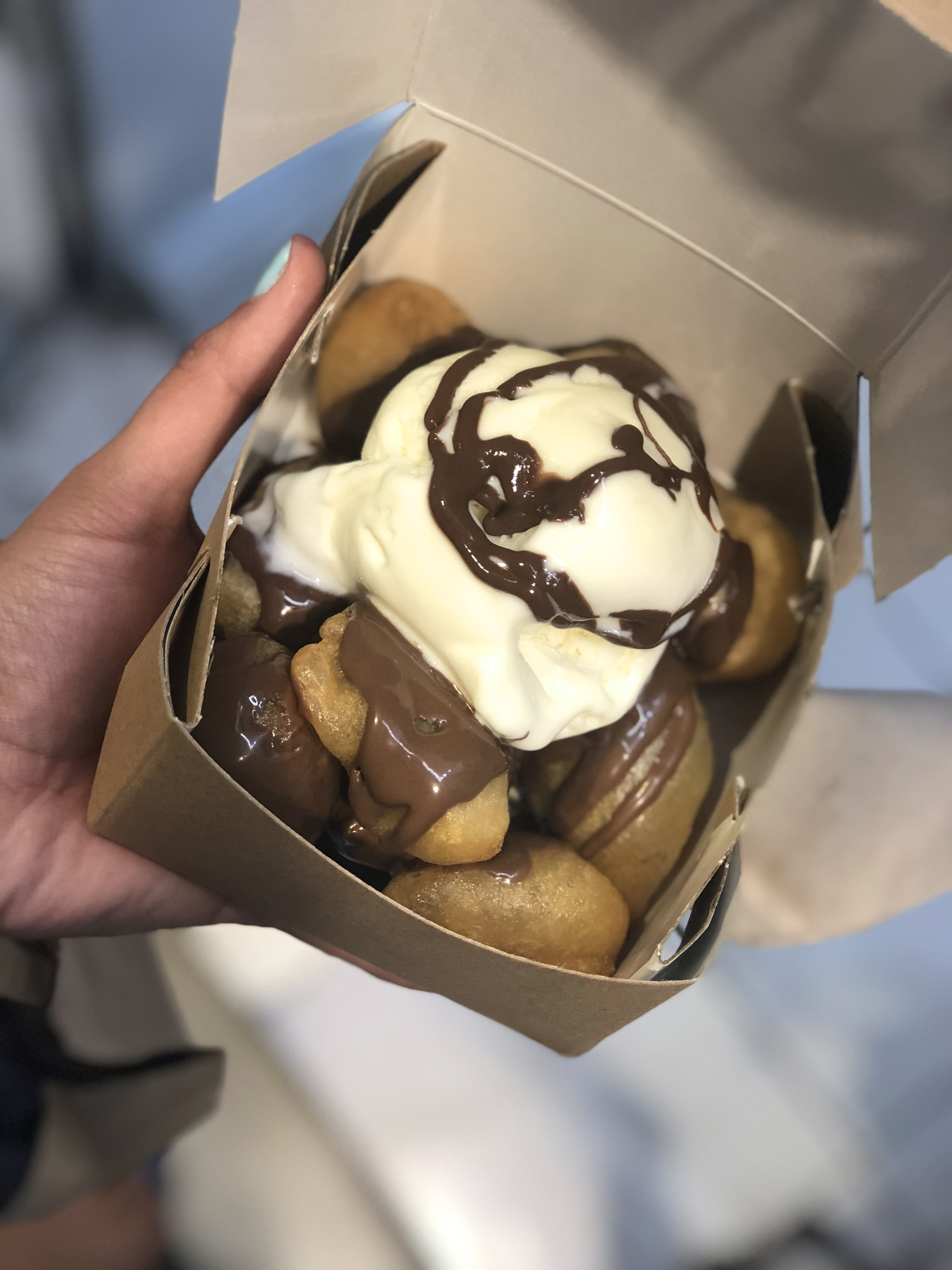 Loukoumades - fried dough in syrup and chocolate