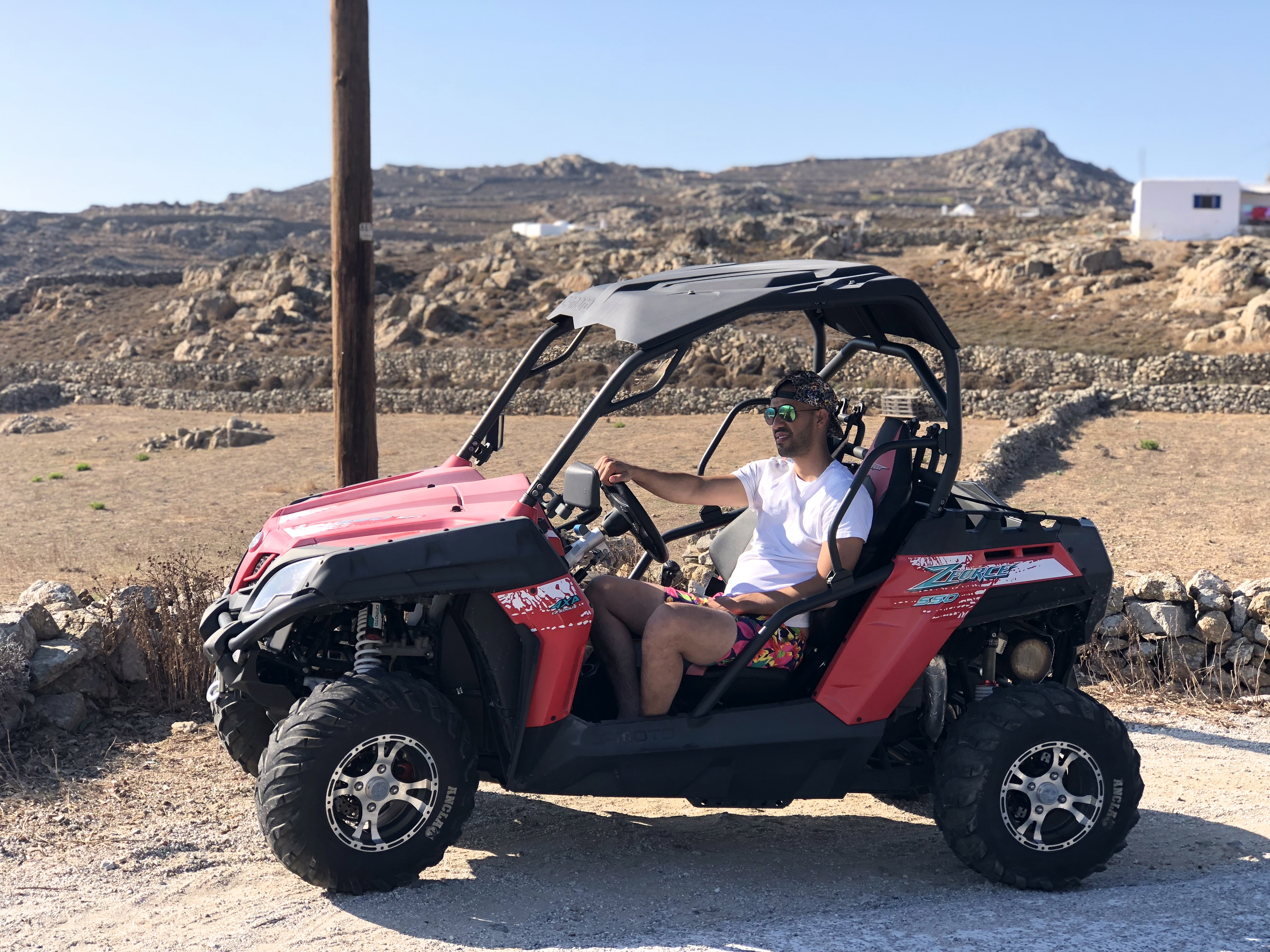 Mustafa riding the ATV in Mykonos