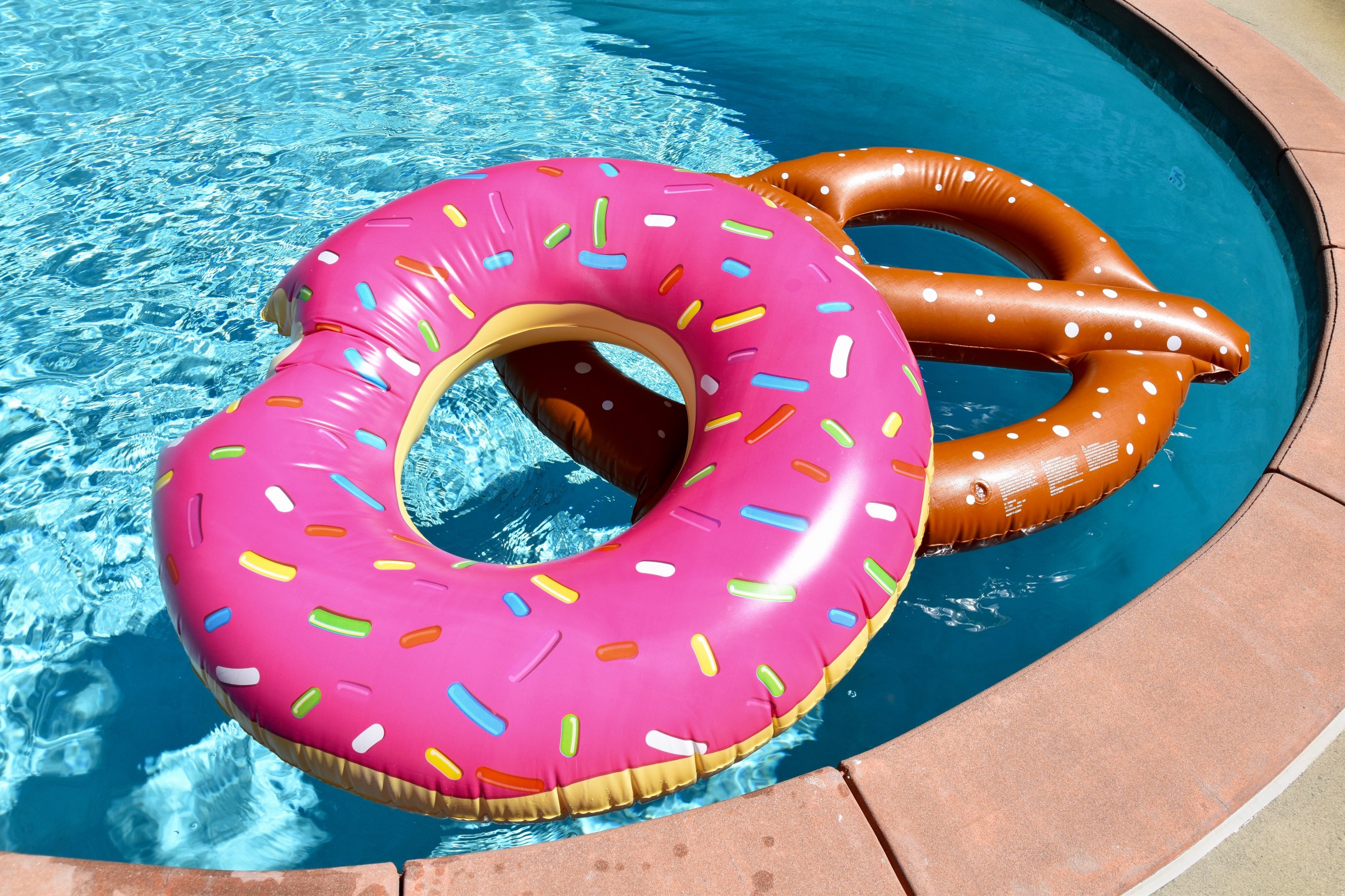 pool float donut and pretzel